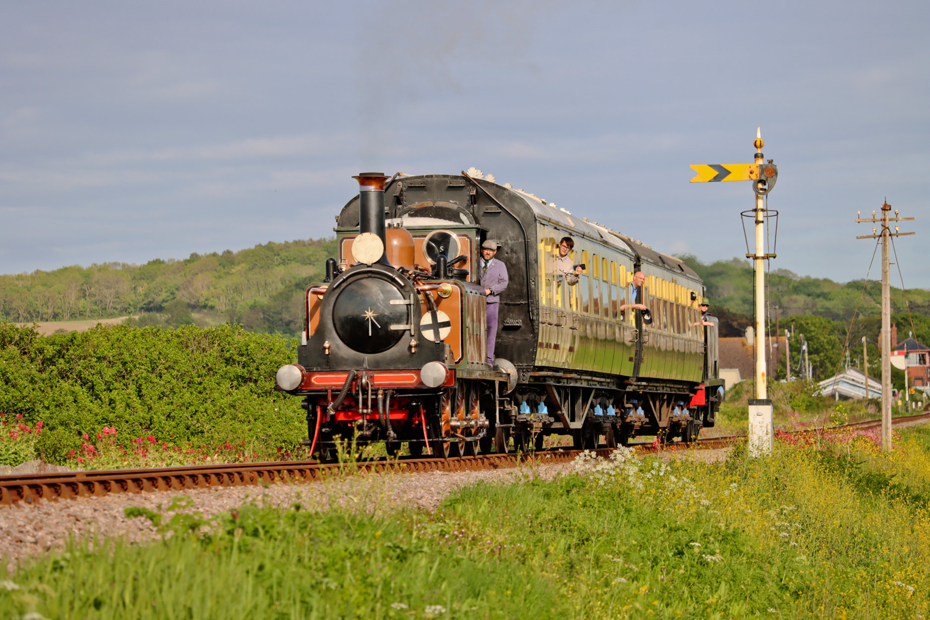 Terrier no.72 'Fenchurch' departs Blue Anchor, Somerset, England and passes Dingle Crossing with a train for Minehead from Blue Anchor during the Spring Steam Spectacular Gala at the West Somerset Railway 3 May 2025 - Ashley Smith.