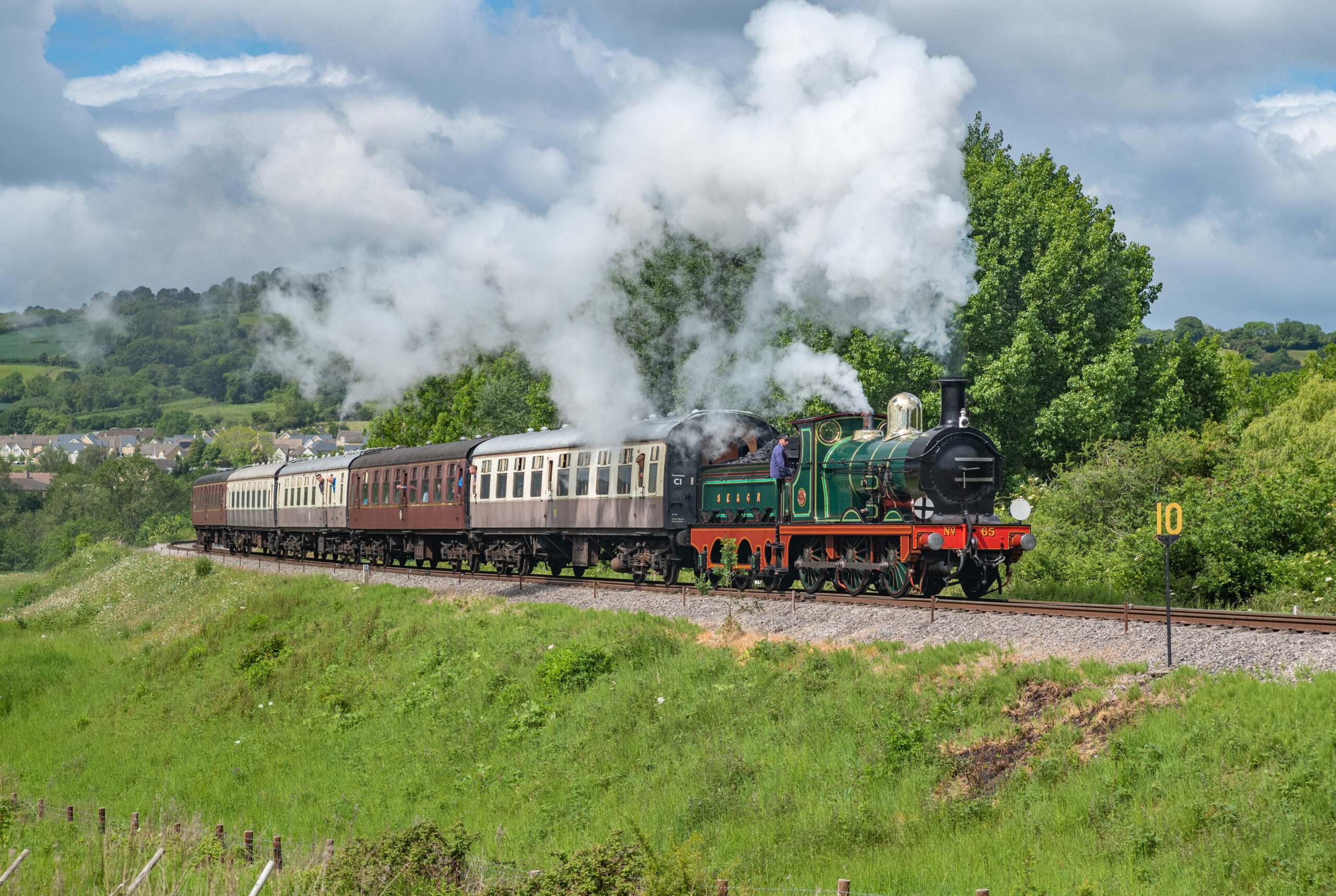 65 rounds Chicken Curve having just left Winchcombe with the 9.50 from Cheltenham Race Course on 25 May 2025 (Nick Gilliam)